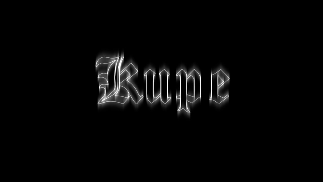 In white gothic font the word Kupe is written on a black screen.