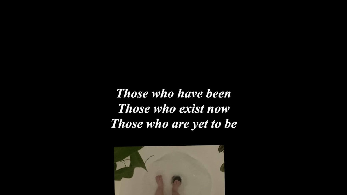 A black background with white text that reads 'Those who have been, Those who exist now, Those who are yet to be'. Underneath the text is a square image of a baby's feet in a bath.
