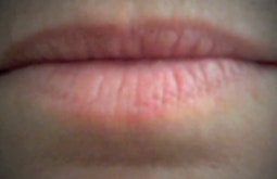 A very close up pair of lips.