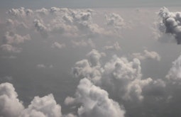 Dense clouds are seen from above.