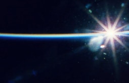 Lens flare with orange and blue colours.