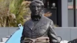 A statue of a colonial figure is made to talk as a deepfake.
