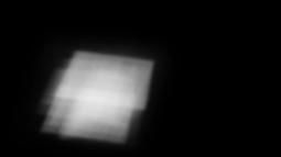 Scattered light appears on the ground surrounded by shadow.