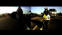 Passing Manoeuvre with two motorcycles and 584 vehicles for two-channel video installation