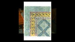 A scanned drawing of patterned kowhai flowers and other foliage is laid over a table and chair.