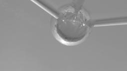 A black & white view of the Atomium sculpture in Brussels looking up from the ground.
