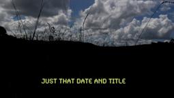 Grass seed heads are silhouetted against a cloudy sky. At the bottom reads the text, Just that date and title.