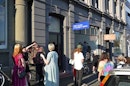 People mulling about outside Blue Oyster gallery in Dunedin