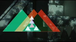 Digital coloured triangular patterns are imposed over footage a sculpture installation featuring the same shapes.