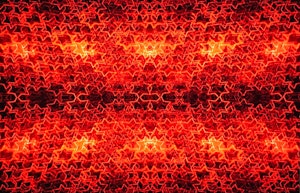A fiery red image made up of hundreds of red glowing stars on a black background. In some parts of the image the stars have so many layers it almost becomes a block colour. The layering of the image creates depth.