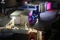 Shipping containers are lit up with lights and art on Wellington's waterfront for the Performance Arcade