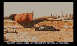 A person with no pants on is lying on a piece of concrete near a cityscape, the text below the image reads "Clothjing retailers in NY City report strong earnings for April 2003"