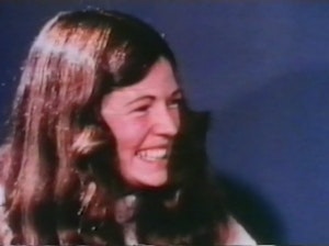 a 1970s woman smiles