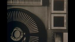 A close up of a film slide projector.