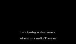 text reads: I am looking at the contents of an artist's studio. There are..
