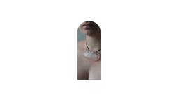 An arch shaped image against a white background of an ice necklace melting against a persons skin.