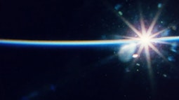 Lens flare with orange and blue colours.