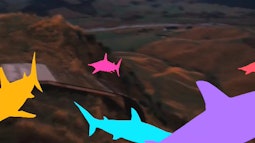 Multicoloured animated sharks swim above country hills.