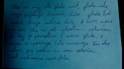 Handwritten text on a piece of paper.