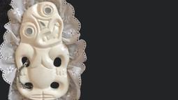 A white tiki is made to talk as a deepfake.
