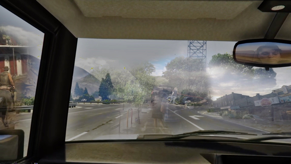 From inside a car we see a mixed reality animated scene; at left a cowboy, in the centre and right fragments of an urban shopping and road scene, plus unnaturally close trees. IN the top right we the face of a the artist as if they are playing a game and we are watching them