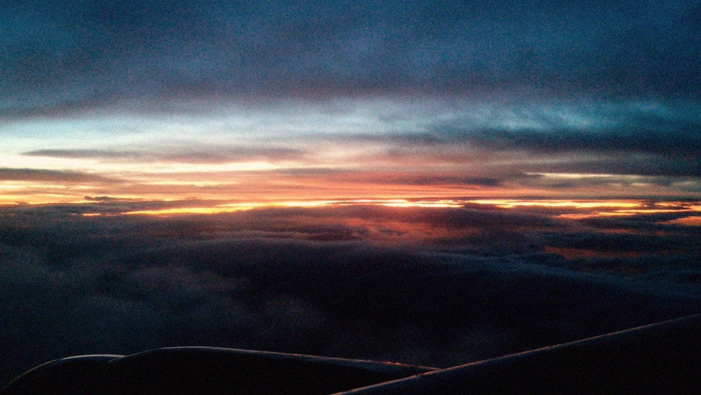 The last glimmers of a beautiful sunset from a plane