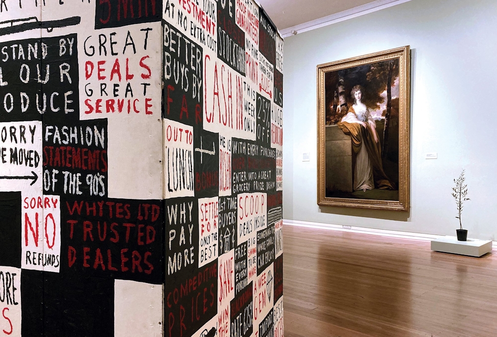 Peter Robinsons hand painted text blocks read "Great deals great service. Fashion statements of the 90's. Sorry no refunds. Better buys by far. Why pay more. This week only"