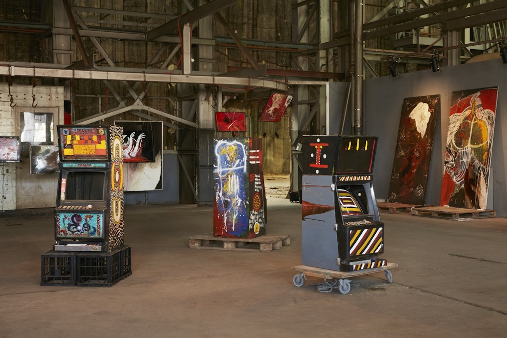 Three gaming machines have been painted with aboriginal symbology