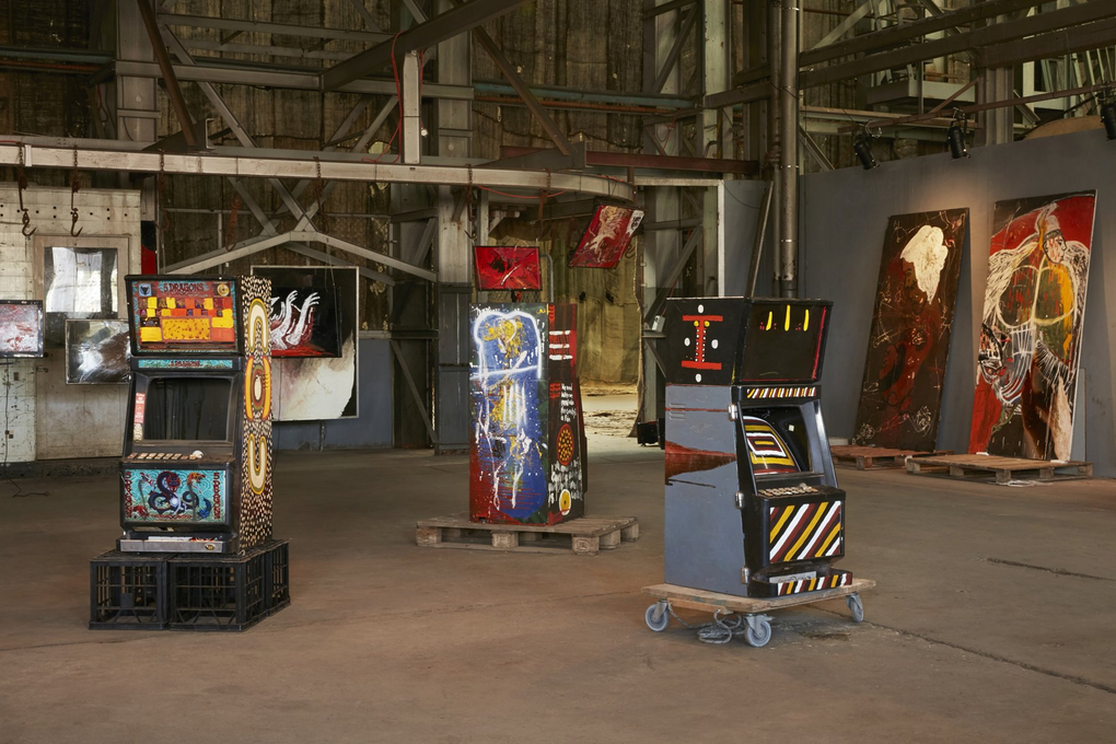 Three gaming machines have been painted with aboriginal symbology