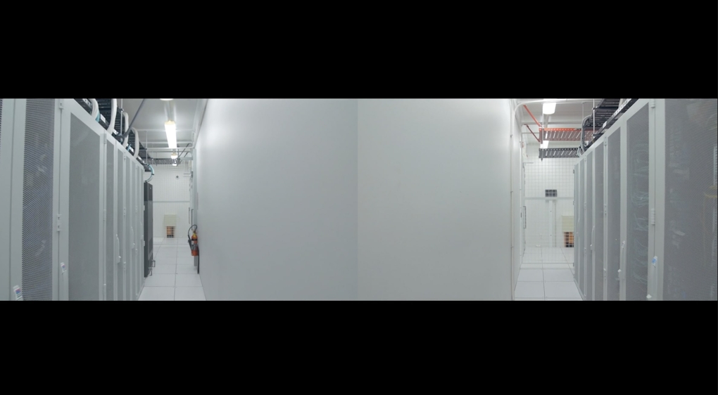 A split screen of two views of industrial white corridors