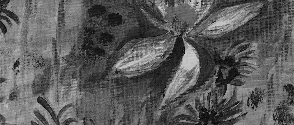 A black and white close up of a painting