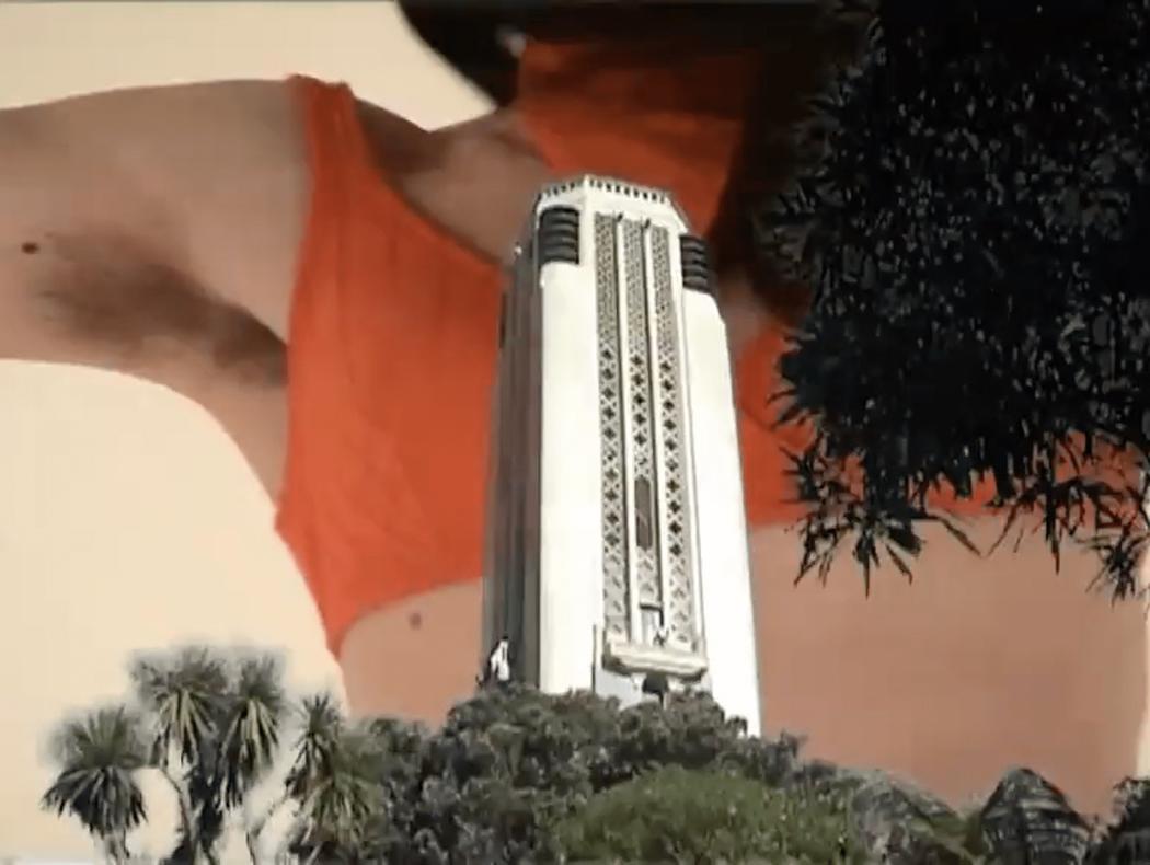 A still from Bek Coogan’s work shows a close up of an armpit of a body that is dancing. The dancing body is layered behind images of the war memorial tower at Pukeahu Park in Wellington Central.