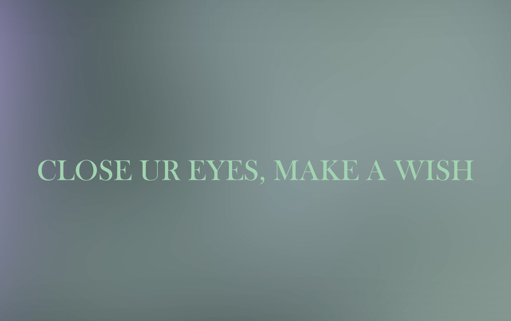 Light green text reads 'CLOSE UR EYES, MAKE A WISH' against a grey-purple background