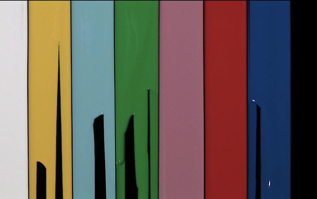 Eight vertical fields of paint sit next to each other. Each vertical field is the same size, but differently coloured. Some are incomplete. Placed alongside each other, the columns of paint resemble SMPTE colour bars, a standard measure for setting a television monitor to reproduce correct chrominance and luminance information.