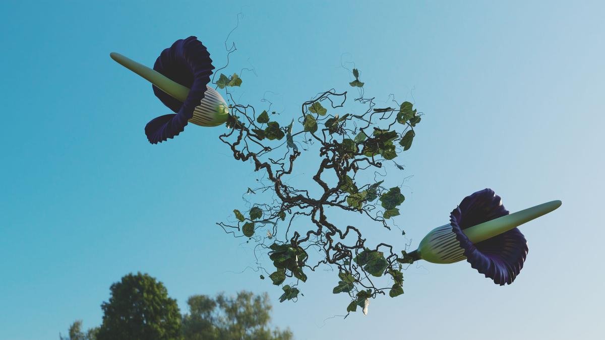 An animated image of floral shapes against a blue sky.