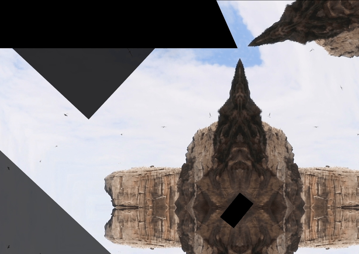 Fragmented rocky landscapes are mirrored with a kaleidoscope effect