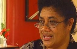 A Tongan woman is interviewed in her home.