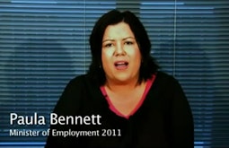 A woman speaks to the camera, her name Paula Bennet and Minister of Employment 201 is written on screen.