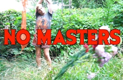 A person stands in an overgrown garden with their arms stretched above their head. In bold red text the words 'NO MASTERS' are written on screen.
