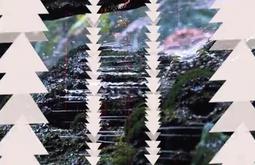 Moss covered rocks with water trickling down. Triangle Māori patterns are digitally imposed on top.