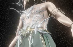A CGI persons torso is seen from below, there are many stars behind them. Silver and gold shapes adorn their body.