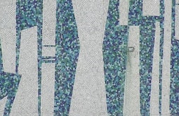 A large mosaic decorates a corporate buildings roof.