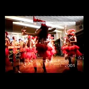 Several overlapping frames from video footage of Polynesian dancers dated 2001