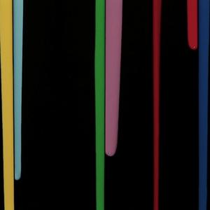 Against a black void background, long paint drips lines of yellow, teal, green, musky pink, blood red and navy blue.