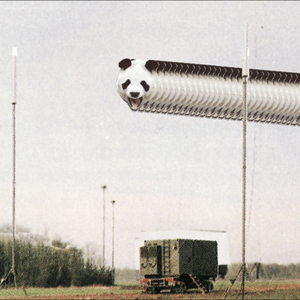 A magazine cutout of a field with a square green truck in the middle with a panda's head, repeated several times and appearing overhead