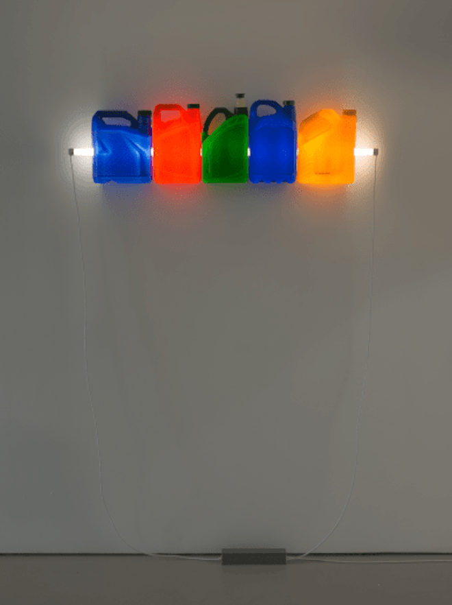 plastic bottles with a fluorescent tube through it