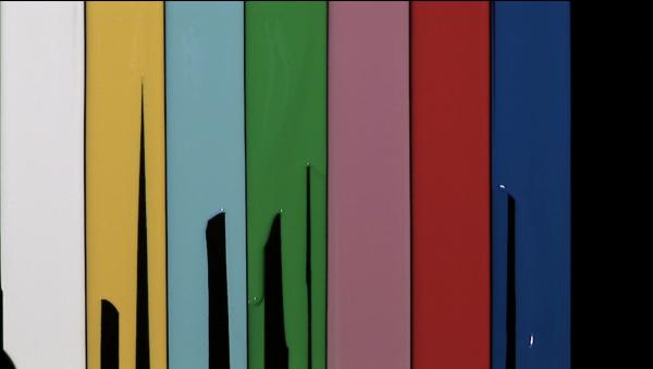 Eight vertical fields of paint sit next to each other. Each vertical field is the same size, but differently coloured. Some are incomplete. Placed alongside each other, the columns of paint resemble SMPTE colour bars, a standard measure for setting a television monitor to reproduce correct chrominance and luminance information. Eight vertical fields of paint sit next to each other. Each vertical field is the same size, but differently coloured. Some are incomplete. Placed alongside each other, the columns of paint resemble SMPTE colour bars, a standard measure for setting a television monitor to reproduce correct chrominance and luminance information.